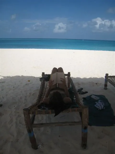 Robyn relaxing by one of the nicest beaches we have ever been to. Kendwa beach, Zanzibar