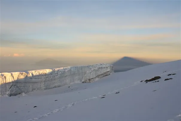 Nearing the top. The shadow on the right is of Kili. The mountain on the left is Mt Meru, the second highest peak in Tanzania