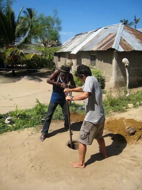 Glen and Kifimbo digging the bore hole
