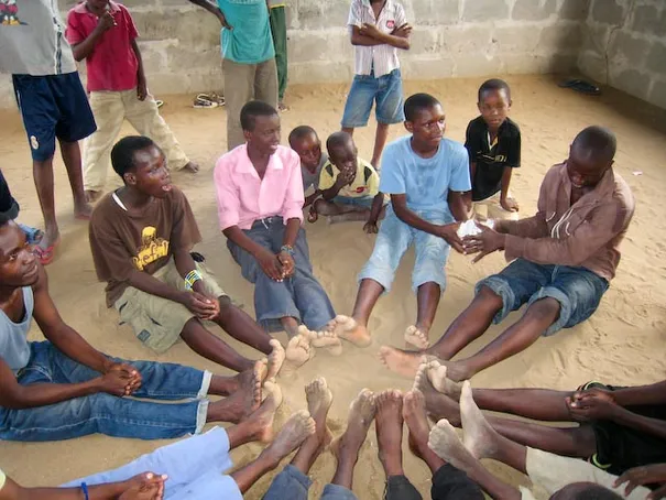 The students playing pass-the-parcel