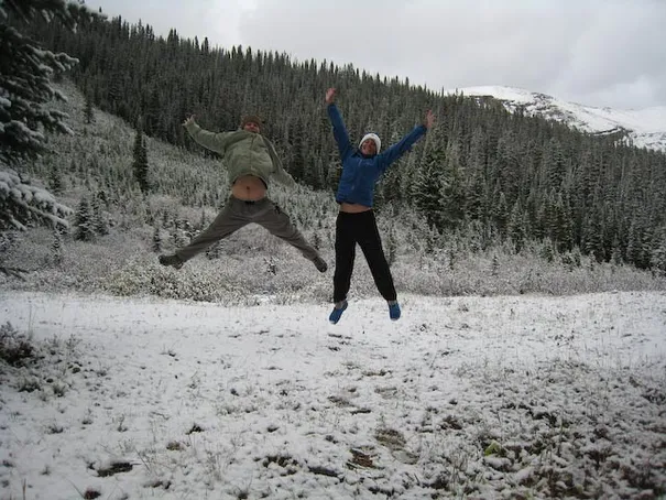 Jumping for joy after the first snowfall of the trip, Yoho National Park
