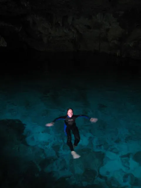 Robyn enjoying the crystal clear water of Dos Ojos
