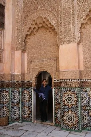 Robyn exploring the intricate carvings of the Ali be Youssef Mosque, Marrakesh