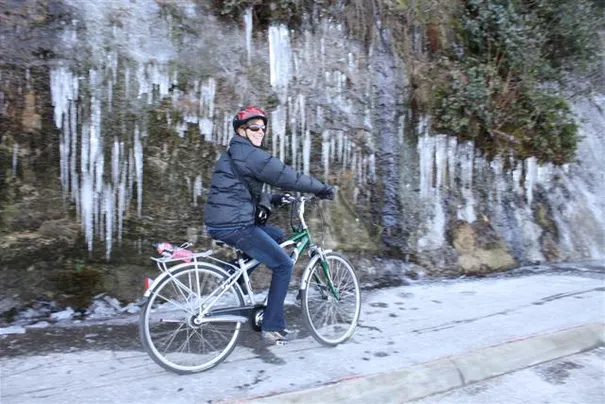 Robyn speeding by while riding around Stanley Park (a park the size of Downtown Vancouver).