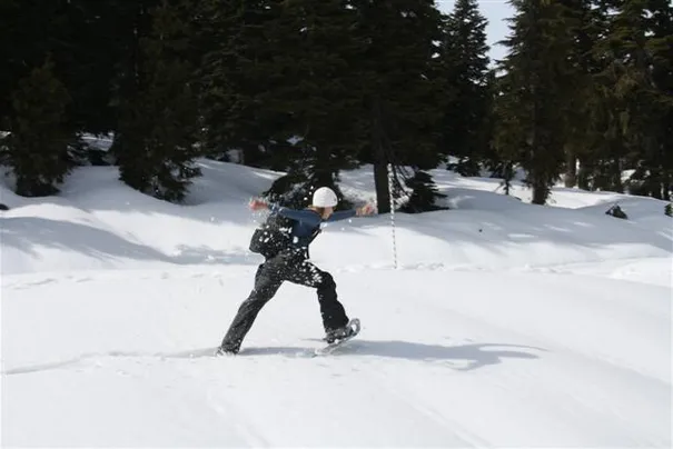 Robyn trying to run in snow shoes, its not as easy as you would think.
