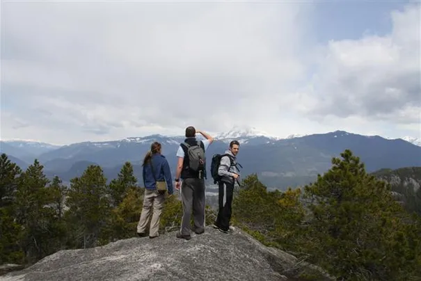 Robyn, Steve and Drew enjoying the view after a hard climb to the top of the Stawamus Chief. A massive granite rockface that is popular among rock climbers.