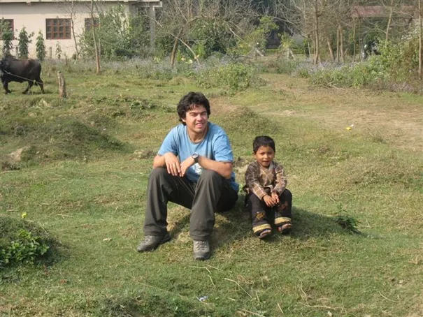 Glen relaxing with Sujan, one of the cutest kids ever