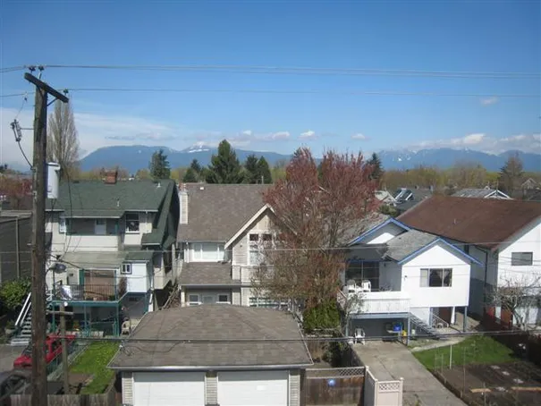 The view from our bedroom window, including the amazing mountains that surround Vancouver!!!