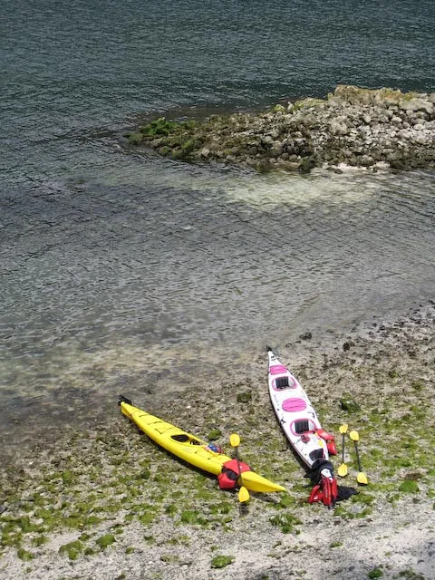 The Kayaks on the shore of the tiny island where we stopped for lunch
