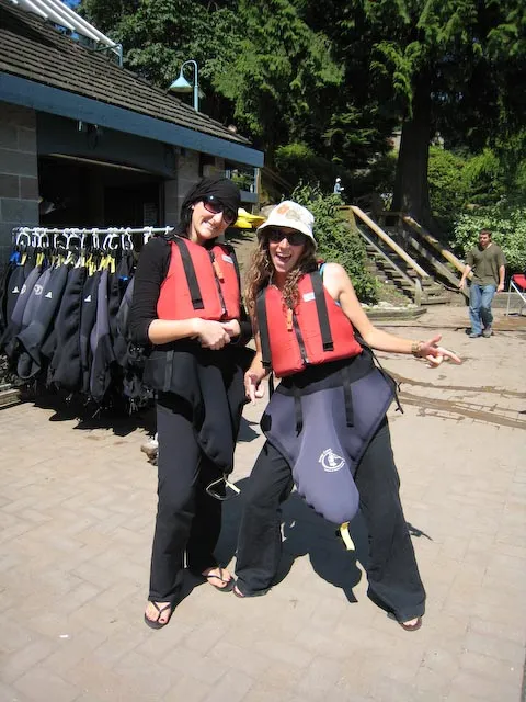 Hannah and Robyn getting suited up for the kayaking