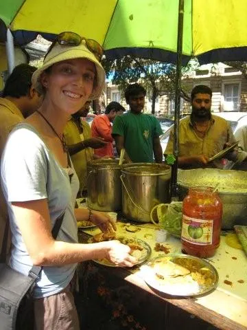 Robyn enjoying a streetside Thali (meal) for less than a dollar, Mumbai.