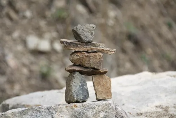 Our very own Inukshuk. If you want and explanation (http://en.wikipedia.org/wiki/Inukshuk)